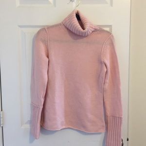 Chunky pink turtleneck sweater